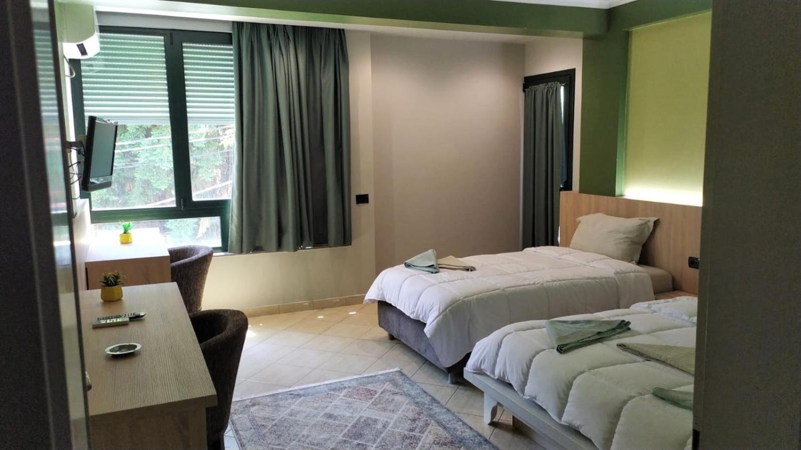 Luander Hotel Tirana Cameră foto