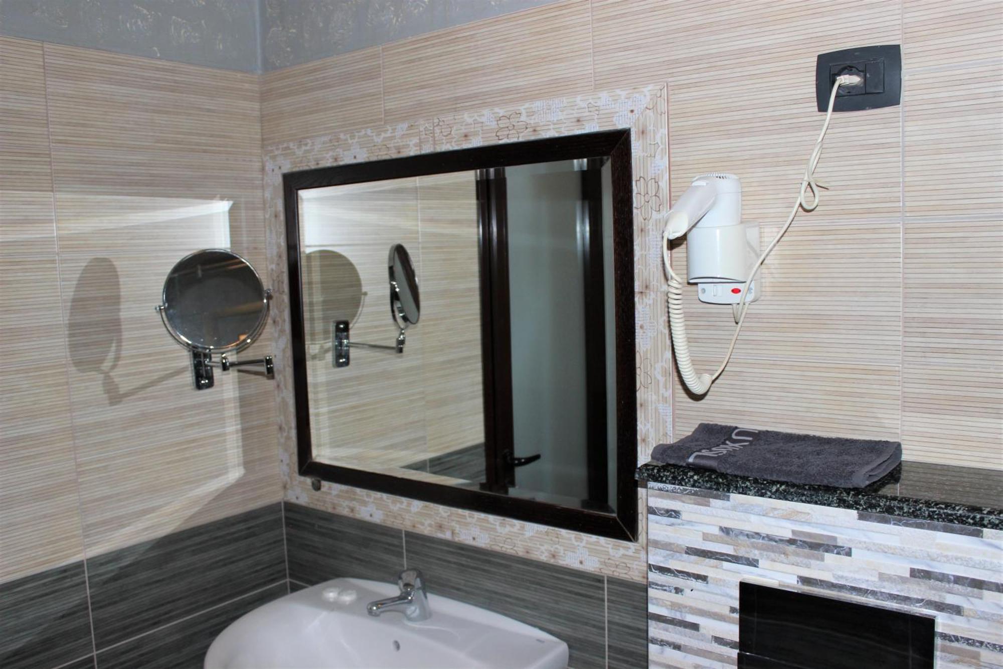 Luander Hotel Tirana Cameră foto